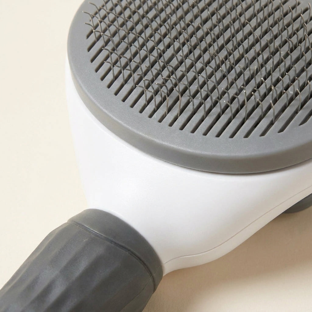 Brosse de Toilettage Auto-Nettoyante pour Chat
